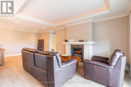 405 - 340 Sugarcreek Trail, London, ON - Indoor Photo Showing Living Room With Fireplace