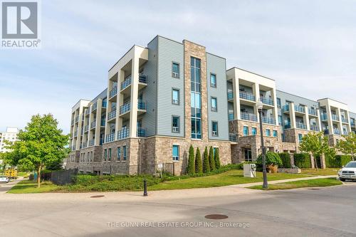 405 - 340 Sugarcreek Trail, London, ON - Outdoor With Balcony With Facade