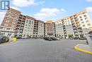 706 - 39 New Delhi Drive, Markham, ON  - Outdoor With Balcony With Facade 