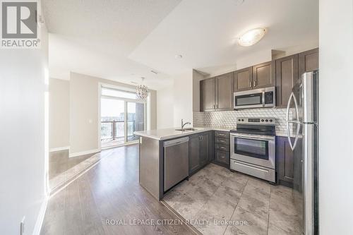 706 - 39 New Delhi Drive, Markham, ON - Indoor Photo Showing Kitchen With Upgraded Kitchen