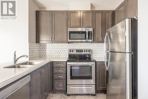 706 - 39 New Delhi Drive, Markham, ON - Indoor Photo Showing Kitchen With Double Sink With Upgraded Kitchen