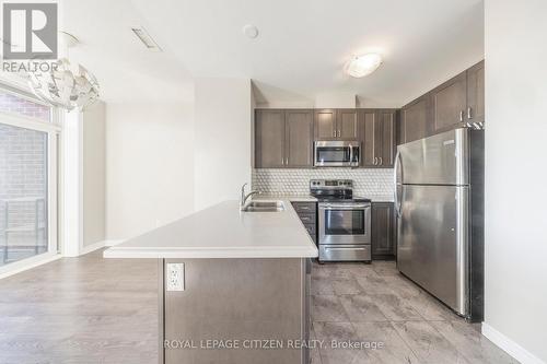 706 - 39 New Delhi Drive, Markham, ON - Indoor Photo Showing Kitchen With Double Sink With Upgraded Kitchen