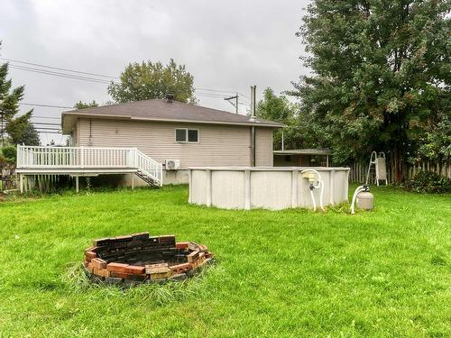 Backyard - 49 Boul. Lacombe, Repentigny (Le Gardeur), QC - Outdoor With Above Ground Pool With Deck Patio Veranda With Backyard