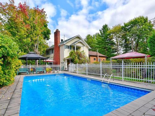 Pool - 153 Rue L'Espérance, Lavaltrie, QC - Outdoor With In Ground Pool With Backyard