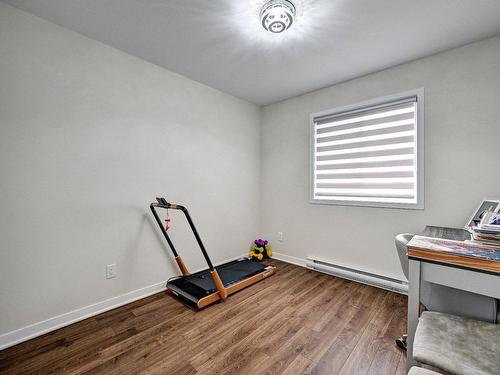 Chambre Ã Â coucher - 204 Rue Mactier, Mascouche, QC - Indoor Photo Showing Gym Room