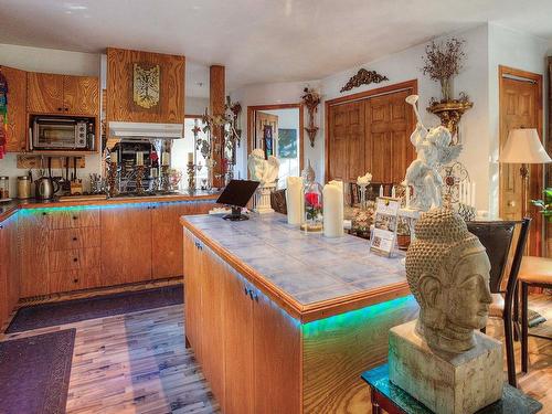 Kitchen - 52  - 54 Ch. Des Rochers, Saint-Sauveur, QC - Indoor With Fireplace