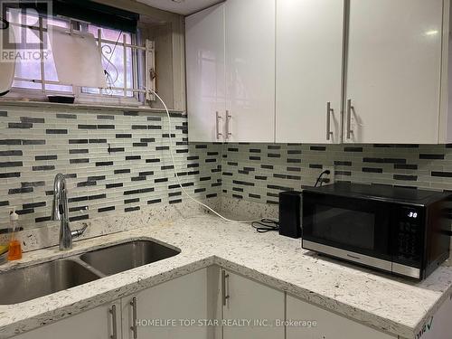 19 Treverton Drive, Toronto, ON - Indoor Photo Showing Kitchen With Double Sink