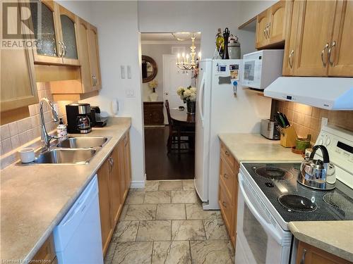 1415 Ghent Avenue Unit# 905, Burlington, ON - Indoor Photo Showing Kitchen With Double Sink