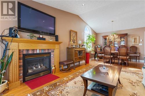 31 Crysler Crescent, Thorold, ON - Indoor Photo Showing Living Room With Fireplace