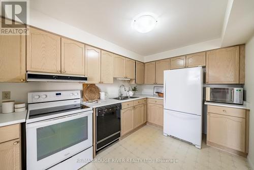 302 - 1 Queen Street, Cobourg, ON - Indoor Photo Showing Kitchen With Double Sink