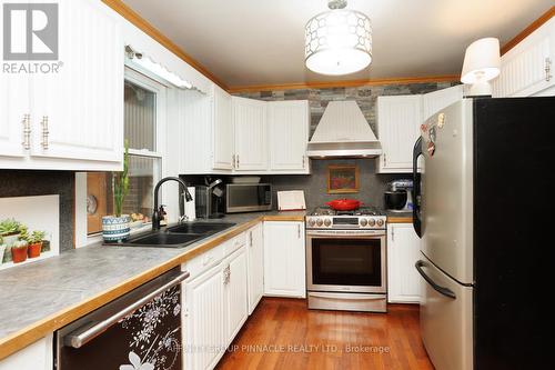 42 St David Street, Kawartha Lakes (Lindsay), ON - Indoor Photo Showing Kitchen With Double Sink