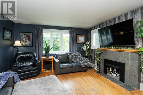 42 St David Street, Kawartha Lakes (Lindsay), ON - Indoor Photo Showing Living Room With Fireplace