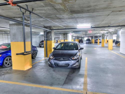 Garage - 331-700 Rue St-Paul O., Montréal (Ville-Marie), QC - Indoor Photo Showing Garage