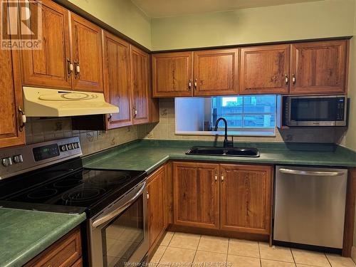 75 Riverside Drive East Unit# 1707, Windsor, ON - Indoor Photo Showing Kitchen With Double Sink