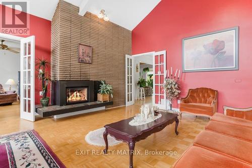 5765 Highway 34 Road, Prescott And Russell, ON - Indoor Photo Showing Living Room With Fireplace