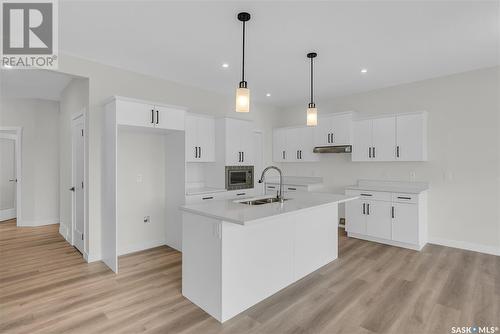 348 Leskiw Bend, Saskatoon, SK - Indoor Photo Showing Kitchen With Double Sink