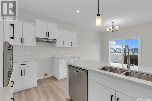 348 Leskiw Bend, Saskatoon, SK - Indoor Photo Showing Kitchen With Double Sink