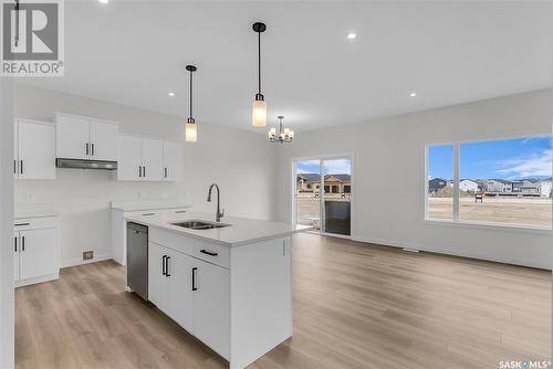 348 Leskiw Bend, Saskatoon, SK - Indoor Photo Showing Kitchen With Double Sink