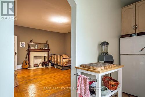 95 Fairholt Road, Hamilton, ON - Indoor Photo Showing Other Room With Fireplace