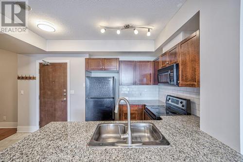 1604 - 1359 Rathburn Road E, Mississauga, ON - Indoor Photo Showing Kitchen With Double Sink