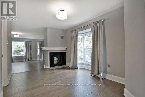 4584 Glastonbury Place, Mississauga, ON - Indoor Photo Showing Living Room With Fireplace