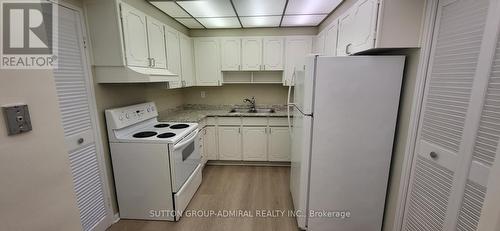 1409 - 130 Neptune Drive, Toronto, ON - Indoor Photo Showing Kitchen With Double Sink