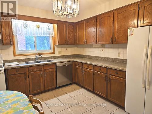 18 Goa Court, Toronto, ON - Indoor Photo Showing Kitchen With Double Sink