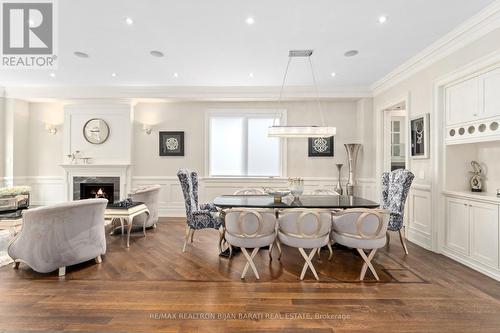 279 Betty Ann Drive, Toronto, ON - Indoor Photo Showing Dining Room With Fireplace