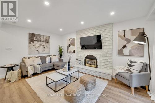 879 Sorrento Avenue, Oshawa, ON - Indoor Photo Showing Living Room With Fireplace