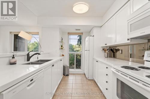 203 - 2119 Lake Shore Boulevard W, Toronto, ON - Indoor Photo Showing Kitchen With Double Sink