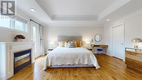 31 Faith Avenue, Toronto, ON - Indoor Photo Showing Bedroom With Fireplace