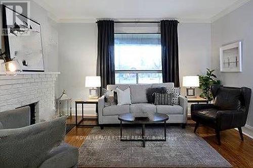 17 Avonlea Boulevard N, Toronto, ON - Indoor Photo Showing Living Room With Fireplace