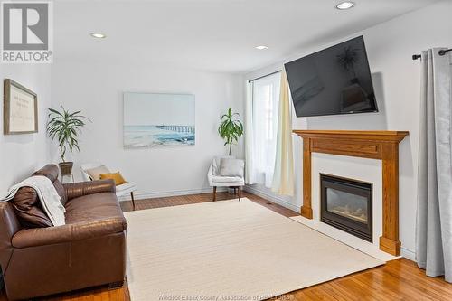 599 Sacred Heart, Lasalle, ON - Indoor Photo Showing Living Room With Fireplace