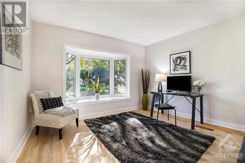 Main floor den. This room is behind the living room and could be opened to create a living-dining area - 46 Farnham Crescent, Ottawa, ON - Indoor