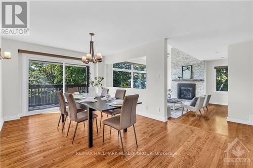 K - 4120 Riverside Drive, Ottawa, ON - Indoor Photo Showing Dining Room With Fireplace