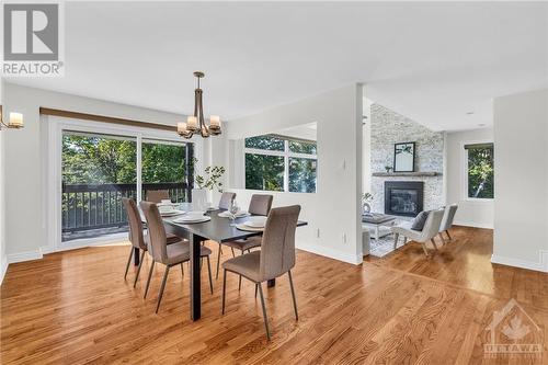 4120 Riverside Drive Unit#K, Ottawa, ON - Indoor Photo Showing Dining Room With Fireplace