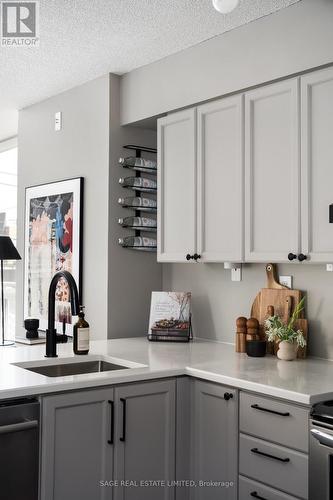 230 - 1029 King Street W, Toronto, ON - Indoor Photo Showing Kitchen With Double Sink