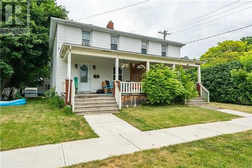 front of building with view of side yard - 137-139 Fifth Street E, Cornwall, ON - Outdoor With Deck Patio Veranda