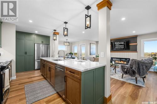 1060 West Park Boulevard, Moose Jaw, SK - Indoor Photo Showing Kitchen With Fireplace With Upgraded Kitchen