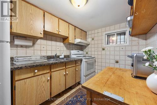 114 Rosemount Avenue, Toronto, ON - Indoor Photo Showing Kitchen With Double Sink