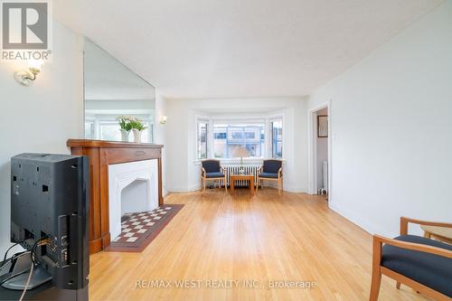 1098 Pape Avenue, Toronto, ON - Indoor Photo Showing Other Room With Fireplace