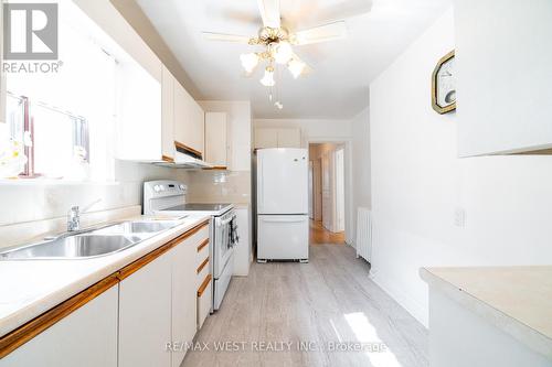 1098 Pape Avenue, Toronto, ON - Indoor Photo Showing Kitchen With Double Sink