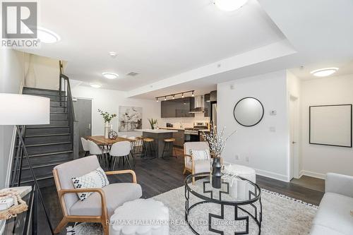 104 - 580 Kingston Road, Toronto, ON - Indoor Photo Showing Living Room