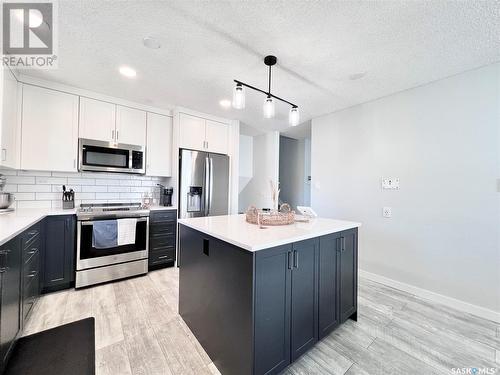 546 Highlands Terrace, Saskatoon, SK - Indoor Photo Showing Kitchen With Double Sink With Upgraded Kitchen