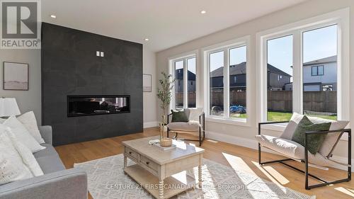 3495 Isleworth Road, London, ON - Indoor Photo Showing Living Room With Fireplace