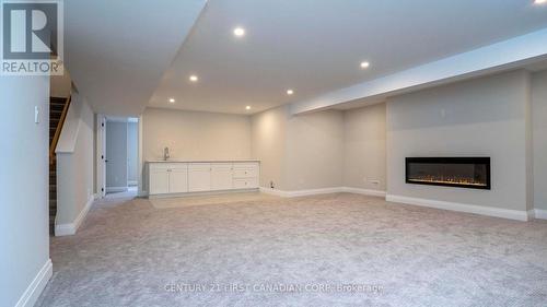 3495 Isleworth Road, London, ON - Indoor With Fireplace