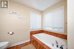 Separate tub and shower in primary ensuite. - 