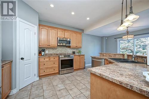 View of kitchen and door to your pantry. - 86 Sinclair Avenue, Carleton Place, ON - Indoor Photo Showing Kitchen With Double Sink