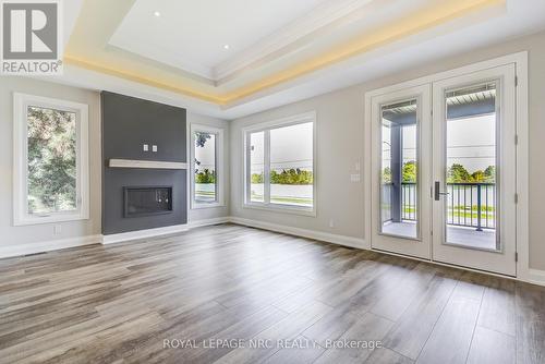 38A Neptune Drive, St. Catharines, ON - Indoor Photo Showing Living Room With Fireplace