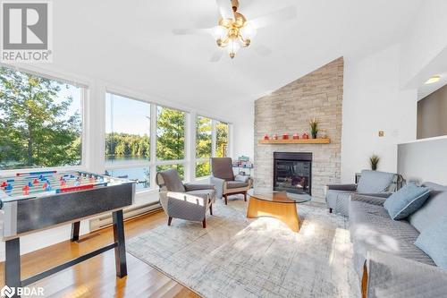 1018C Leisure Ln, Cloyne, ON - Indoor Photo Showing Living Room With Fireplace